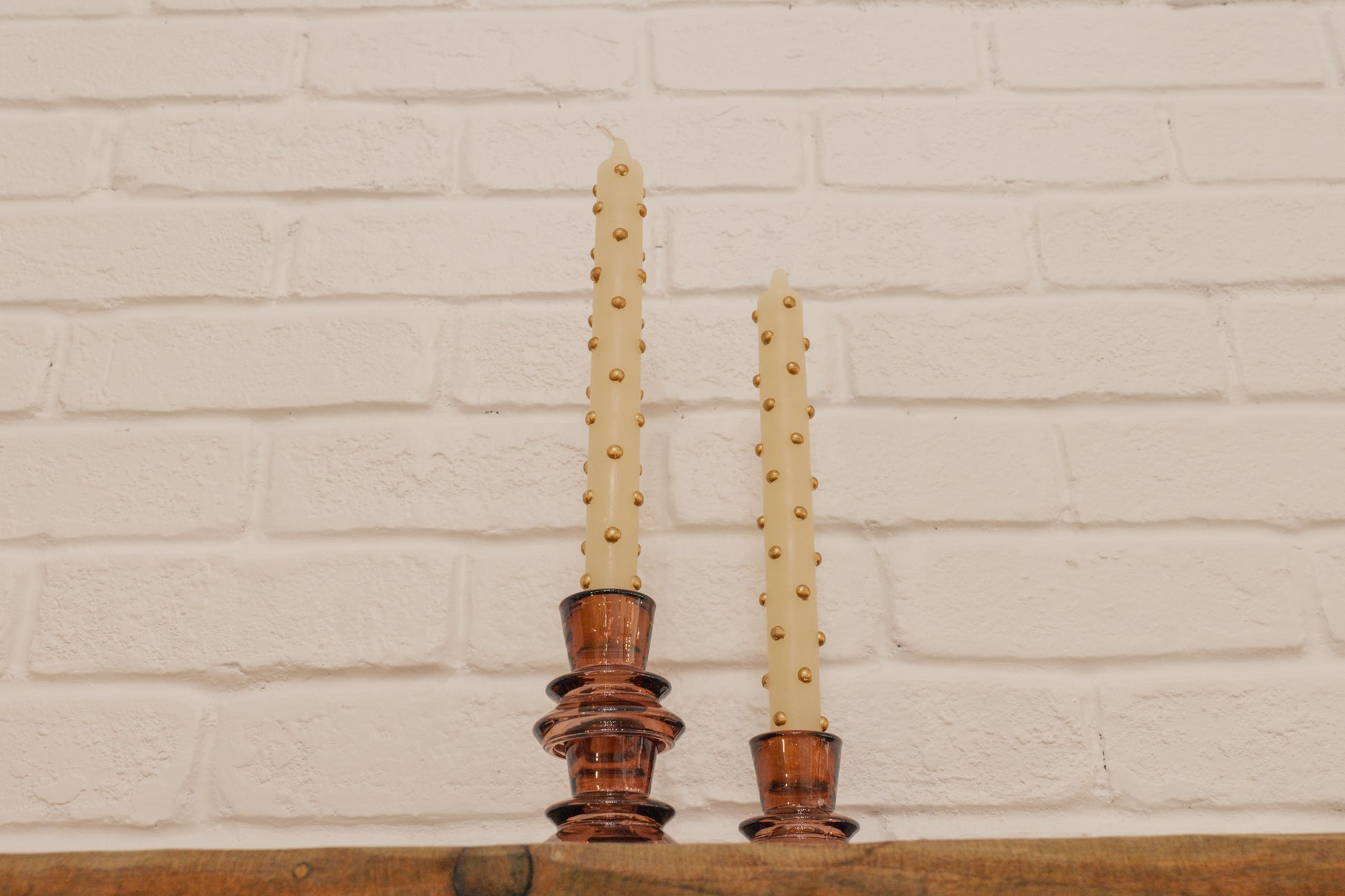 2 Wax gold polka-dot taper candles